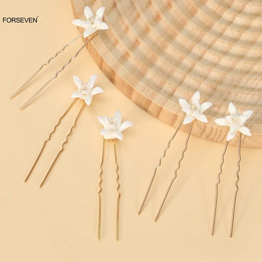 סיכות שיער פרחוניות לכלה